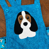 An applique of a Bassett Hound Puppy by snugglepuppyapplique.com