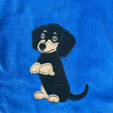 An applique of a Black and Tan Dachshund begging by snugglepuppyapplique.com