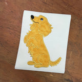 An applique of a long haired dachshund begging on his back legs in 6 sizes by snugglepuppyapplique.com