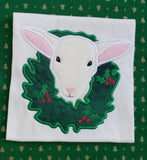 Sheep with a wreath Farmhouse Christmas Applique Embroidery Design by snugglepuppyapplique.com