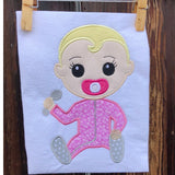 Baby with rattle appliqué embroidery design, snugglepuppyapplique.com