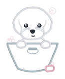 An applique of a puppy dog in a wash basin with soap and bubbles by snugglepuppyapplique.com