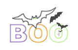 A zigzag appliqué of the word "BOO" with bats flying out of the last "O" by snugglepuppyapplique.com
