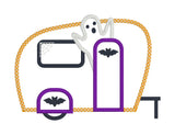 An applique of a camper with a ghost, spiders web and bats by snugglepuppyapplique.com