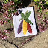 An applique of three ears of decorative corn by snugglepuppyapplique.com