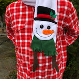 In the hoop snowman scarf wearing top hat with holly and scarf embroidery design by snugglepuppyapplique.com