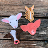 Set of four felties, sheep head, horse head, cow head and pig head by snugglepuppyapplique.com