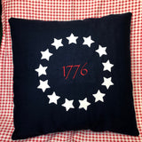 an applique of thirteen stars arranged in a circle with "1776" embroidered in the center, colonial, American colonial snugglepuppyapplique.com