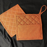 In the hoop quilted potholder machine embroidery design by snugglepuppyapplique.com