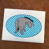 A Bean stitch appliqué design of classic 1927 Eeyore by snugglepuppyapplique.com