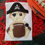 Pirate, Raider, Buccaneer mascot with a football appliqué embroidery design, snugglepuppyapplique.com