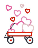 An applique of a wagon full of hearts by snugglepuppyapplique.com