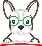 An applique of a French bulldog with his paws on a book and embroidered Glasses on this face by snugglepuppyapplique.com