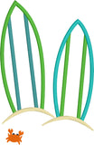 An applique of two surfboards stuck in the sand and an embroidered crab, by snugglepuppyapplique.com
