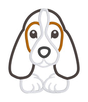 An appliqué design of a Bassett Hound Puppy by snugglepuppyapplique.com