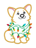 An applique design of a welch corgi wrapped in holiday lights by snugglepuppyapplique.com