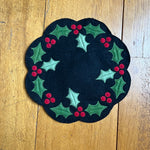 an in the hoop candle mat penny rug with holly by snugglepuppyapplique.com