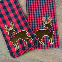 An applique design of a Christmas deer in 6 sizes by snugglepuppyapplique.com