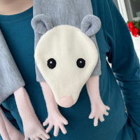 The face of an in the hoop Opossum scarf embroidery design