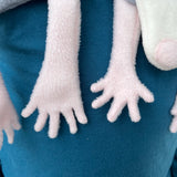 The hands and feet of an in the hoop Opossum scarf Embroidery Design