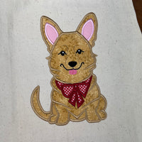 An applique of a Welsh Corgi with a bow around it's neck by snugglepuppyappllique.com