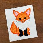 An applique of a fox by snugglepuppyapplique.com