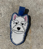 An in the hoop design of a West Highland Terrier Key fob, snap tab by snugglepuppyapplique.com