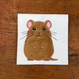 An appliqué of a gerbil sitting on his hind legs  by snugglepuppyapplique.com