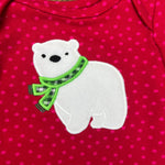 An applique of a cute polar bear cub wearing a scarf by snugglepuppyapplique.com