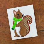 An applique of a squirrel wearing a scarf with 3D fringe by snugglepuppyapplique.com