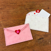 An envelope made of felt with an embroidery machine.