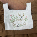 A bean stitch embroidery design of a fawn lying in a bed of flowers in 6 sizes by Snugglepuppyappliqe.com