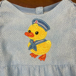 An applique of a duck wearing a sailor suit by snugglepuppyapplique.com
