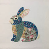 A zigzag appliqué of a patchwork rabbit by snugglepuppyapplique.com