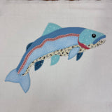 An applique of a patchwork trout by snugglepuppyapplique.com