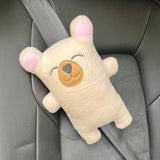 An in the hoop seatbelt bear pillow that attaches around a standard seatbelt. By snugglepuppyapplique.com