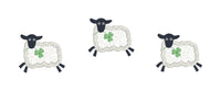 an applique design of three leaping sheep eating clover.