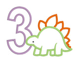 An applique of a stegosaurus
and the number 3 by snugglepuppyapplique.com
