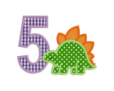 An applique of a stegosaurus
and the number 5 by snugglepuppyapplique.com