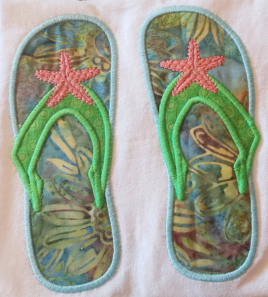 an applique of flip flops with a starfish decoration embroidered on each by snugglepuppyapplique.com