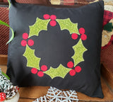 A zigzag applique of holly in the shape of a wreath by snugglepuppyapplique.com