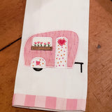 An applique of a camper with window box, heart flowers and heart on door and wheel for St. Valentine's day by snugglepuppyapplique.com