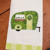 An applique of a camper with clover in window box for St. Patricks day by snugglepuppyapplique.com