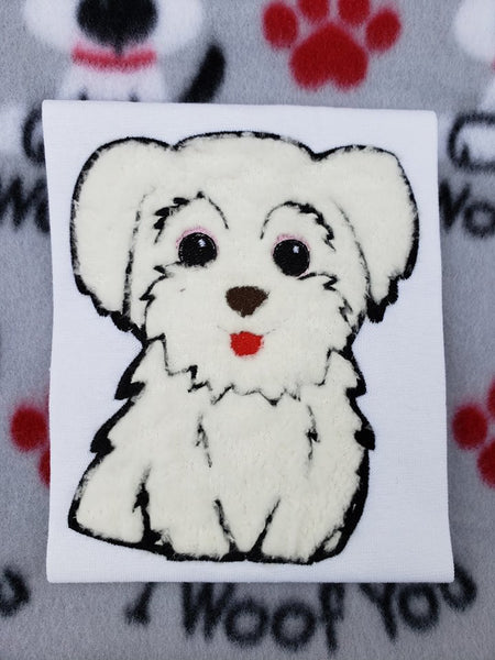Maltese applique embroidery design, stylized tongue is out