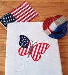 An applique of a butterfly  made like an American Flag, 4th of July, by snugglepuppyapplique.com 