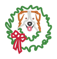 An applique of an Australian Shepherd dog with his head through a Christmas wreath by snugglepuppyapplique.com  Edit alt text