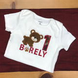 First birthday applique embroidery design, bear cub beside number one and the Barely below, snugglepuppyapplique.com