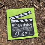 An applique of a clapperboard by snugglepuppyapplique.com