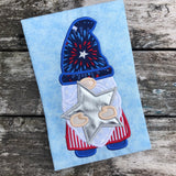 Gnome holding a star 4th of July applique embroidery design by snugglepuppyapplique.com