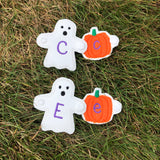 In the hoop Ghosts with upper case letters and Pumpkins with lower case letters. Both snap together to create words by snugglepuppyapplique.com